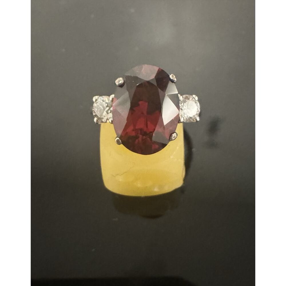 Size 6 Oval Cut Natural Garnet With Zircon Accent